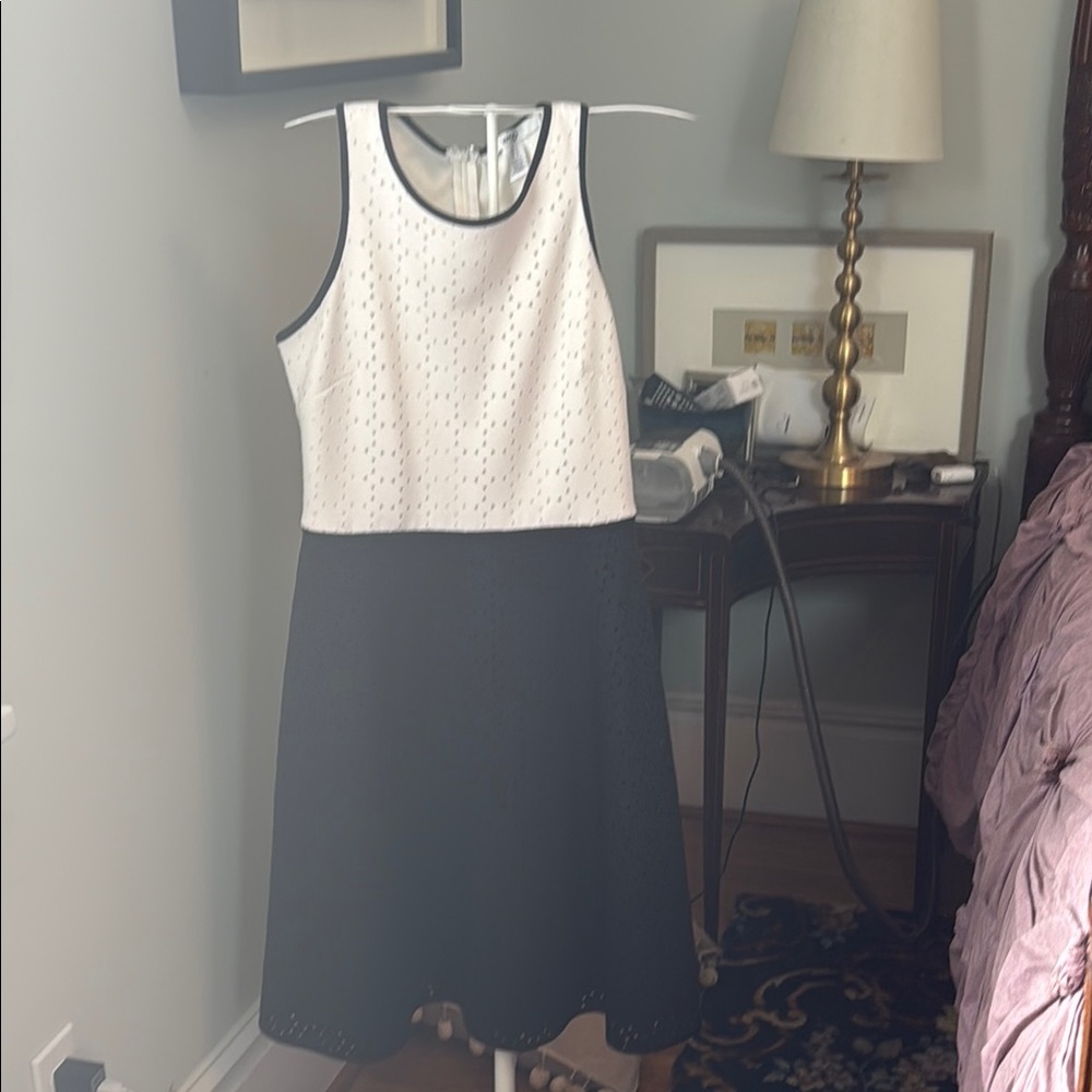 Wisp cutout silhouette a line dress. Worn about two times